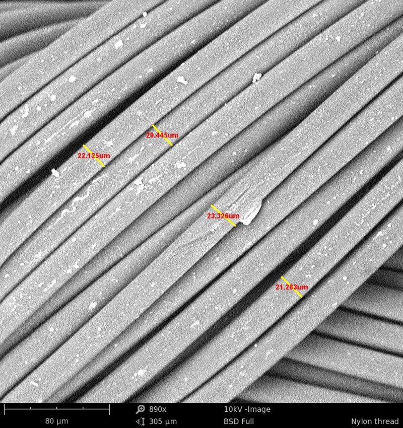 Scanning electron microscopy (SEM) images of stainless steel cloth