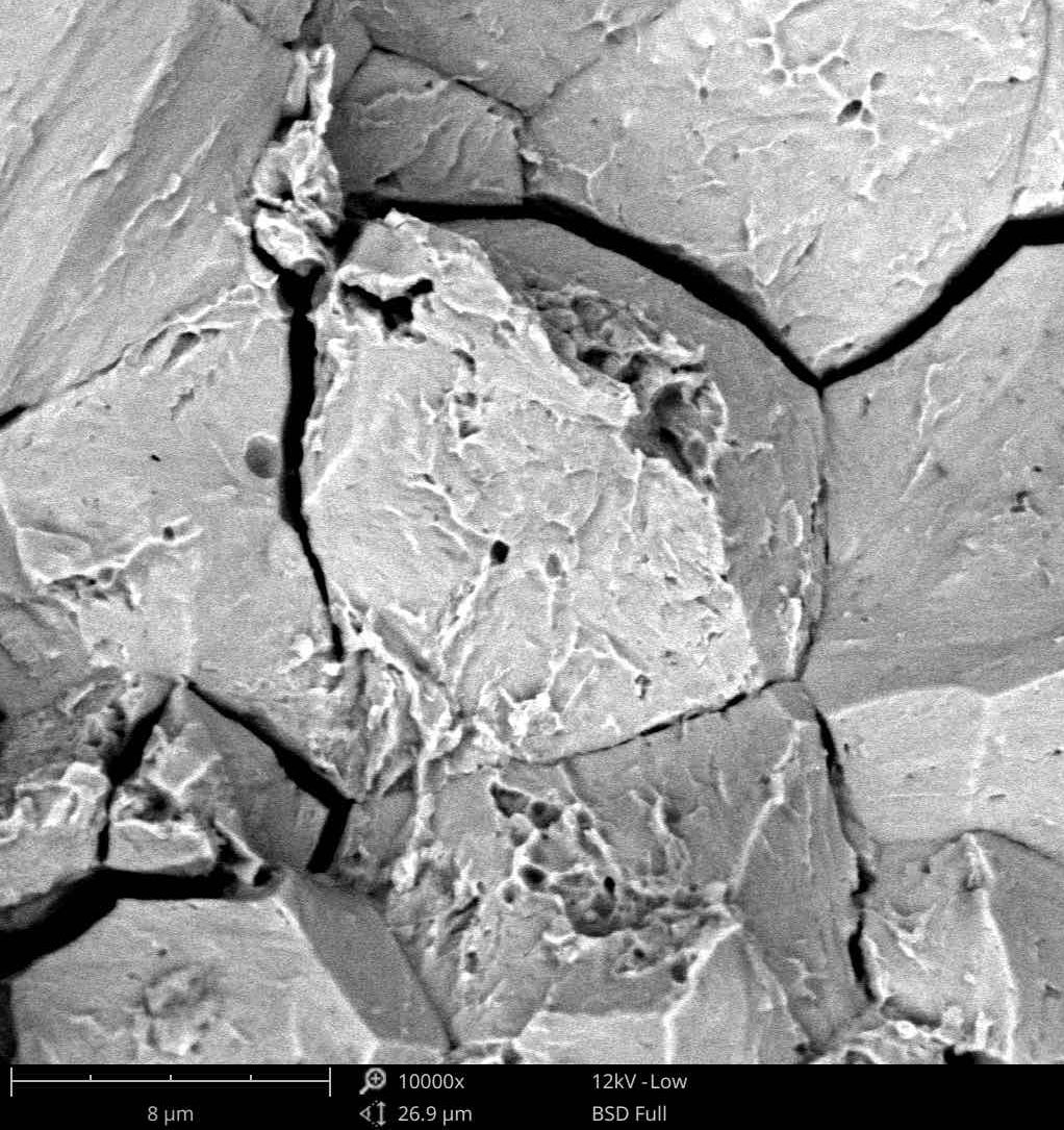 Scanning Electron Microscope Image of the same steel bolt at 10000x magnification