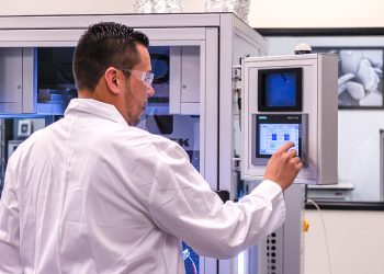 Scientist in front of LE-500 electrospinning/electrospraying system